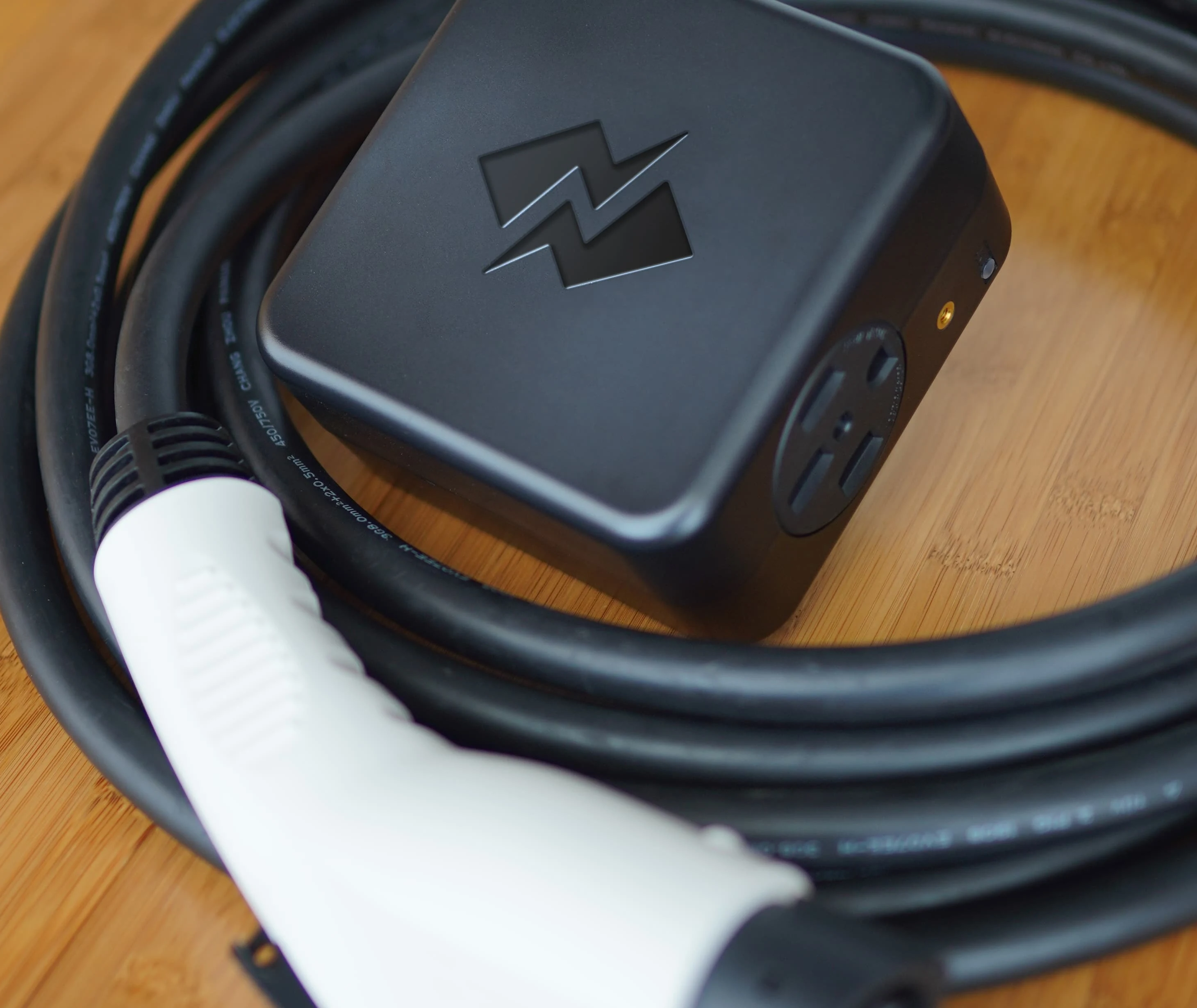 NeoCharge Smart Splitter sharing a 240V outlet for home EV charging